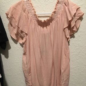 pink off the shoulder shirt